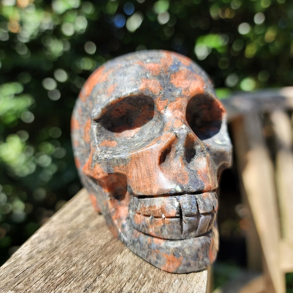Medium Red Snowflake Obsidian Skull